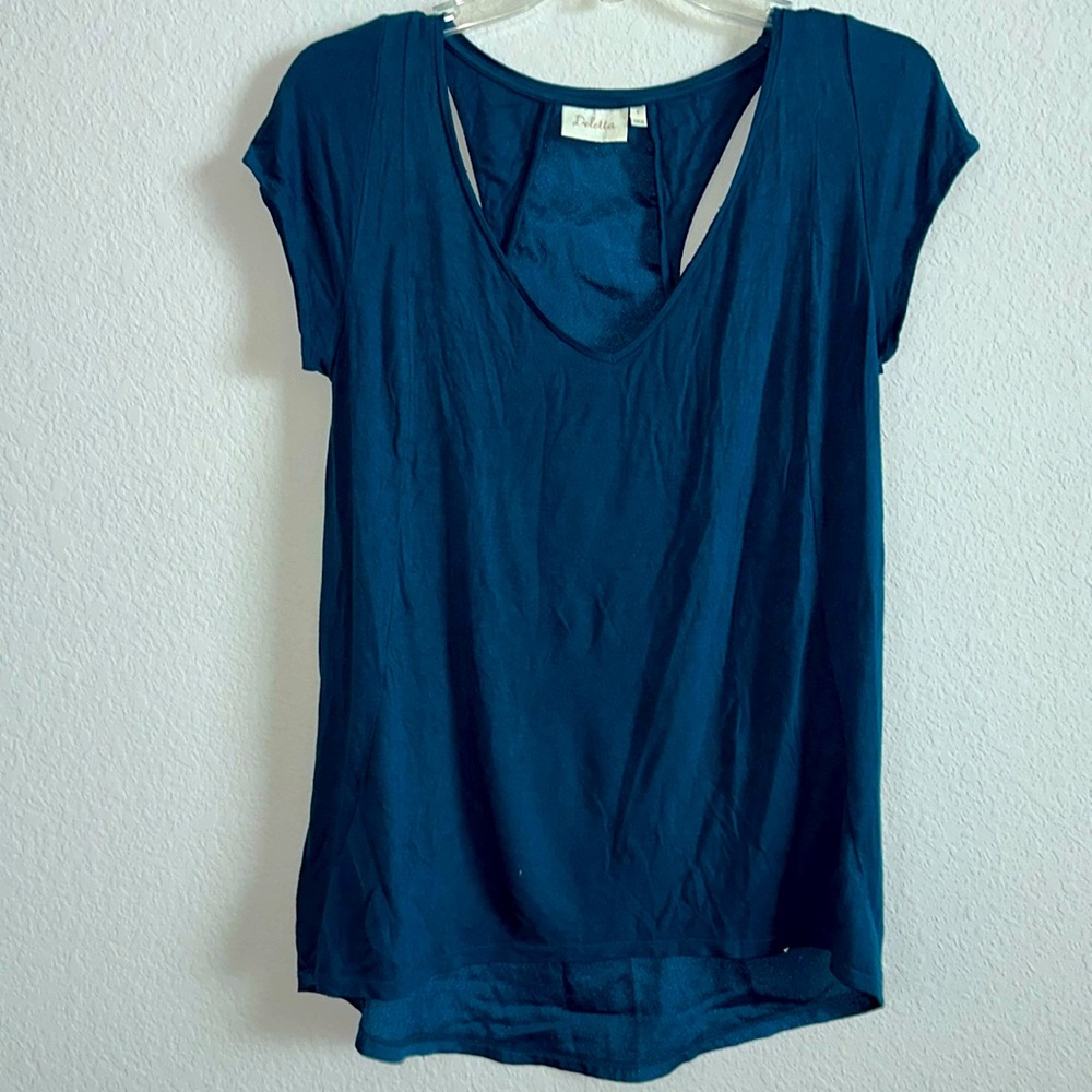 Women top from Anthropologie. Bluish-green. Size M